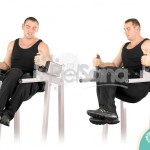 Elevación de rodillas con giro en silla romana (Roman Chair Twisting Knee Raise)